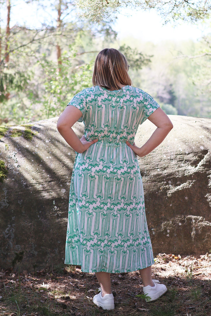 Amy-neulosmekko Amaryllis-kuosilla