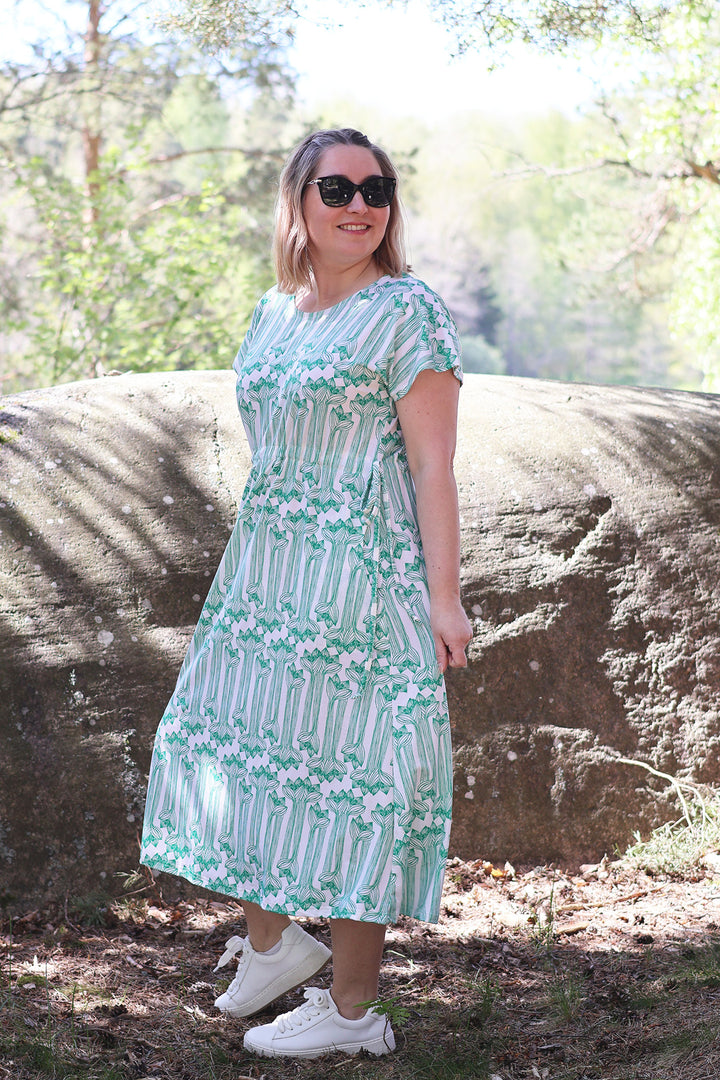 Amy-neulosmekko Amaryllis-kuosilla